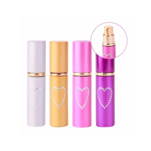 Gas pimienta de defensa personal con diseño tipo perfume portátil y discreto en varios colores.