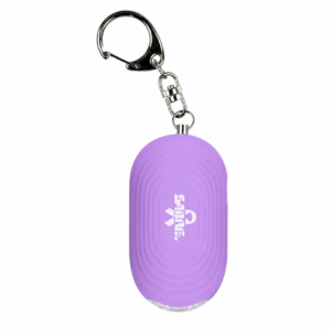 Alarma personal SABRE color morado con luz LED, clip de sujeción y llavero para seguridad y protección personal.