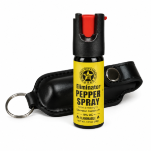 Gas pimienta Eliminator con funda de nylon y llavero, diseño compacto para defensa personal y protección diaria.